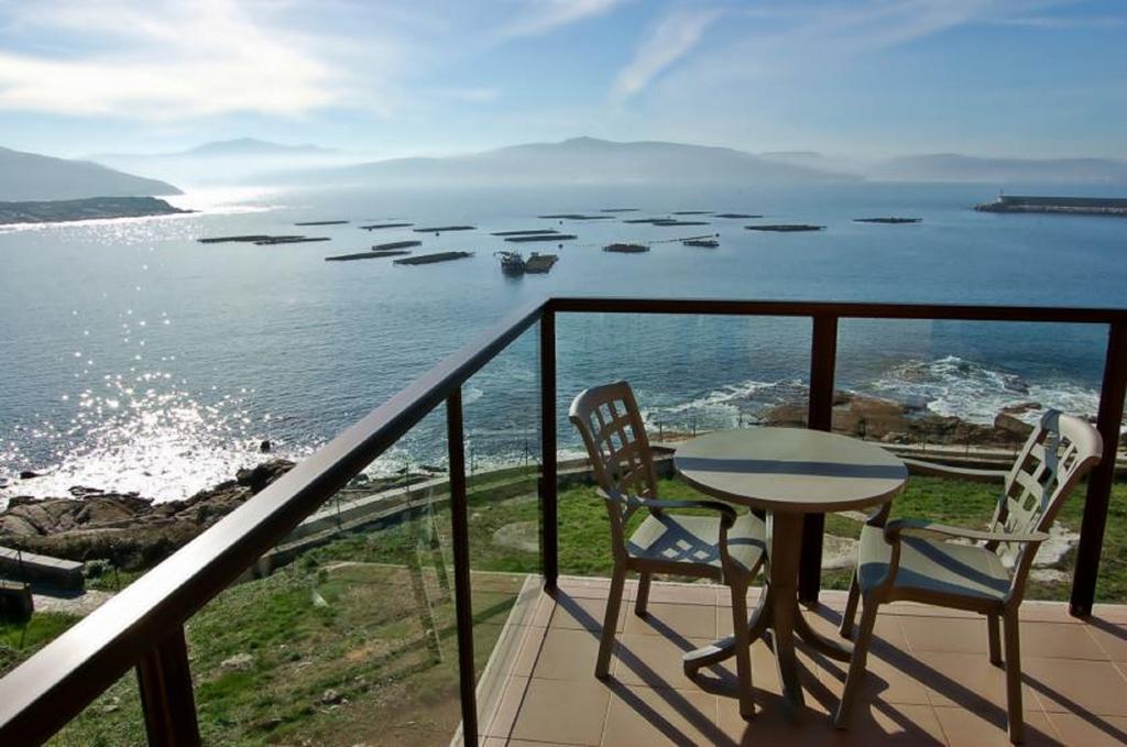 Apartamentos Turisticos Playa De Osmo Corme Exterior foto